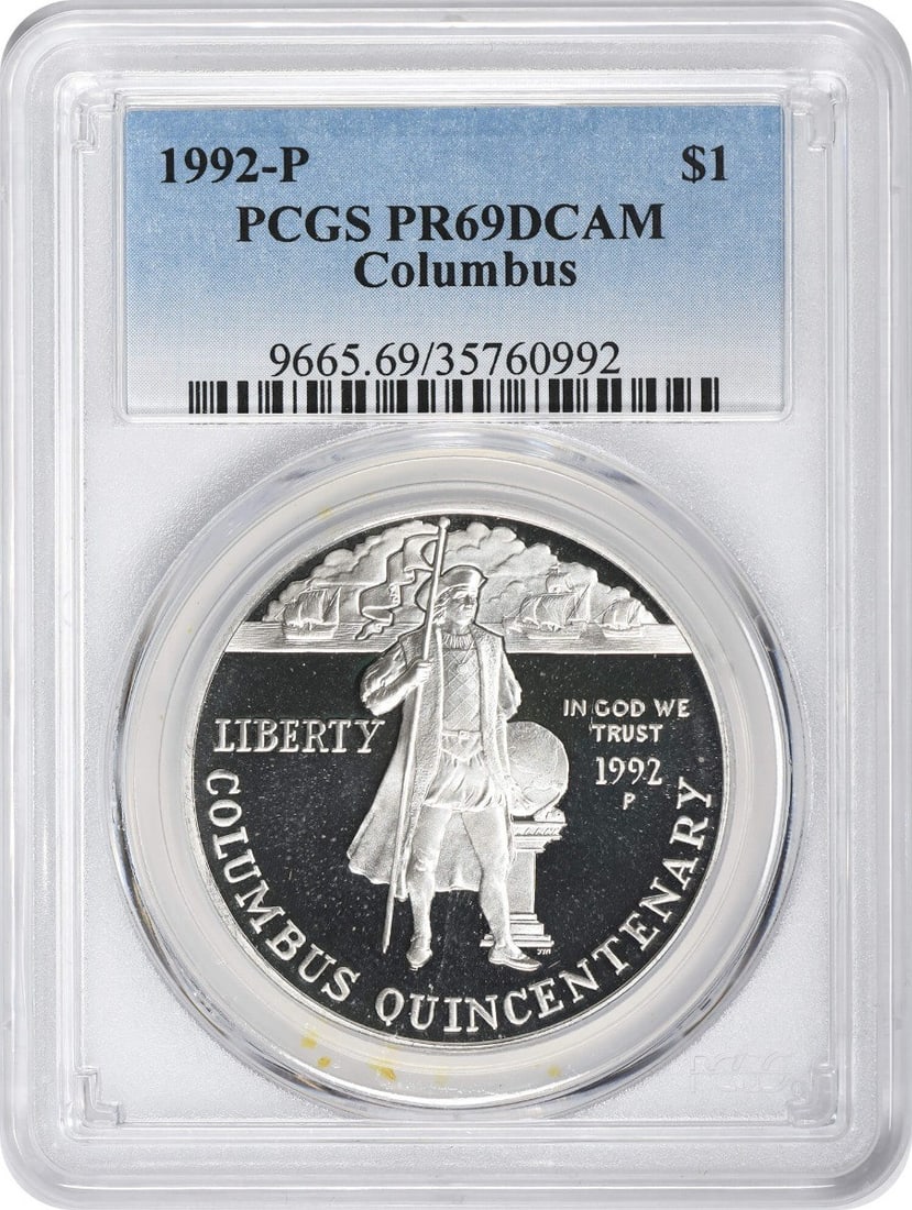 PCGS PR69 Deep Cameo 1992-P Columbus Silver Commemorative Dollar: PCGS PR69 Deep Cameo 1992-P Columbus Silver Commemorative Dollar This 1992-P Columbus Silver Commemorative Dollar is a proof coin graded PR69 Deep Cameo by PCGS. Struck at the Philadelphia Mint, it is