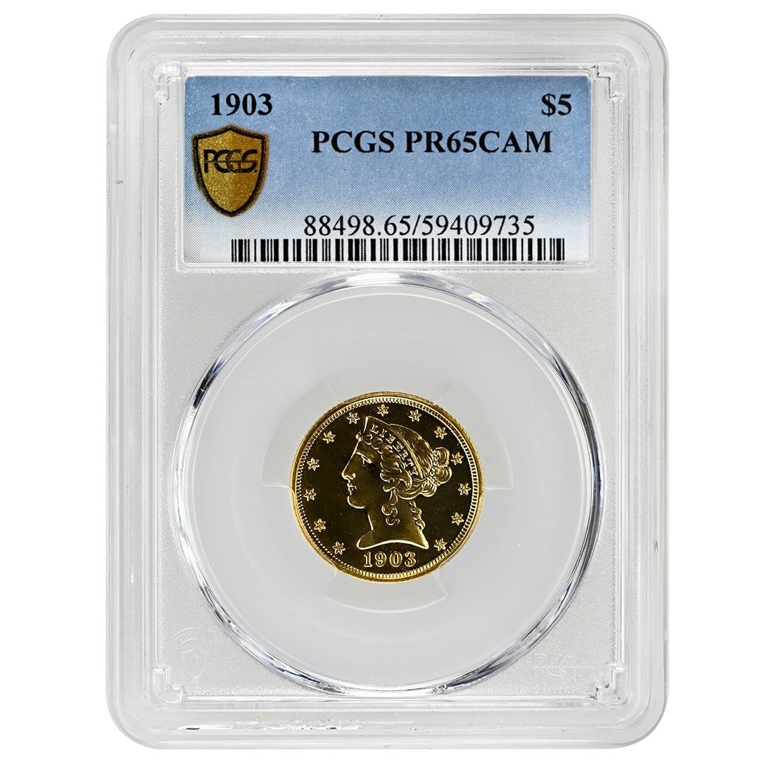 1903 Philadelphia Gold $5 Liberty Head Proof Cameo PCGS PR65CAM: 1903 Philadelphia Gold $5 Liberty Head Proof Cameo PCGS PR65CAM 1903 $5 Liberty Head gold coin graded PCGS PR65CAM. This proof cameo example is described as having heavy mirrored surfaces, frosted dev