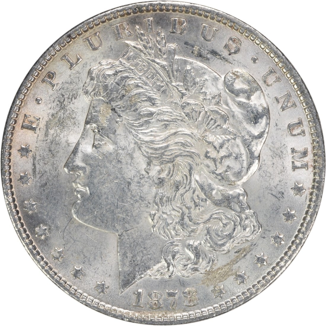 1878 Morgan Silver Dollar AU Slider Uncertified 90% Silver Coin: 1878 Morgan Silver Dollar AU Slider Uncertified 90% Silver Coin This 1878 Morgan Silver Dollar features the renowned design by George T. Morgan. With an AU (Almost Uncirculated) grade, this coin has b