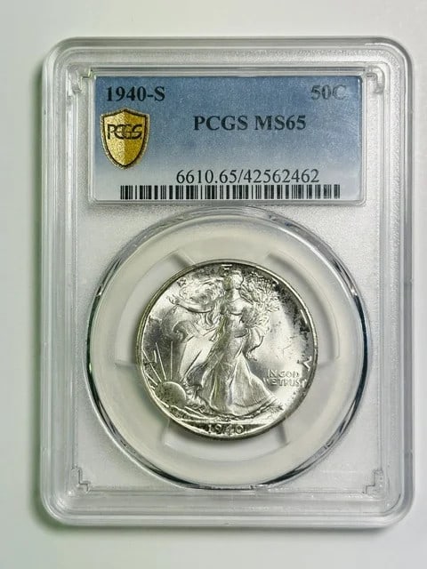PCGS MS65 1940-S Walking Liberty Half Dollar Silver: PCGS MS65 1940-S Walking Liberty Half Dollar Silver This 1940 S Walking Liberty Half Dollar is certified by PCGS with a grade of MS 65, indicating a high-quality uncirculated coin with nice luster. Mi