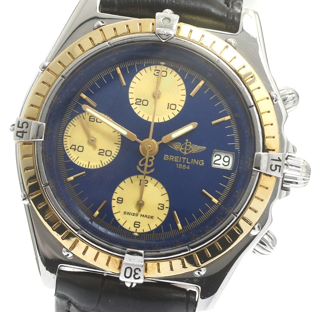 Breitling Chronomat 81.950 mens automatic chronograph wristwatch: Breitling Chronomat 81.950 mens automatic chronograph wristwatch Pre-owned Breitling Chronomat chronograph automatic men's wristwatch with a stainless steel case, navy and gold dial, and leather strap