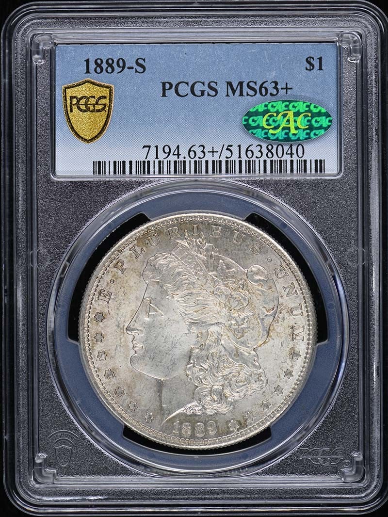 PCGS CAC 1889-S Morgan Dollar MS63+: PCGS CAC 1889-S Morgan Dollar MS63+ This 1889 Morgan Dollar was minted in San Francisco and is graded MS63+ by PCGS, with an additional CAC designation. The coin is uncirculated and originates from th