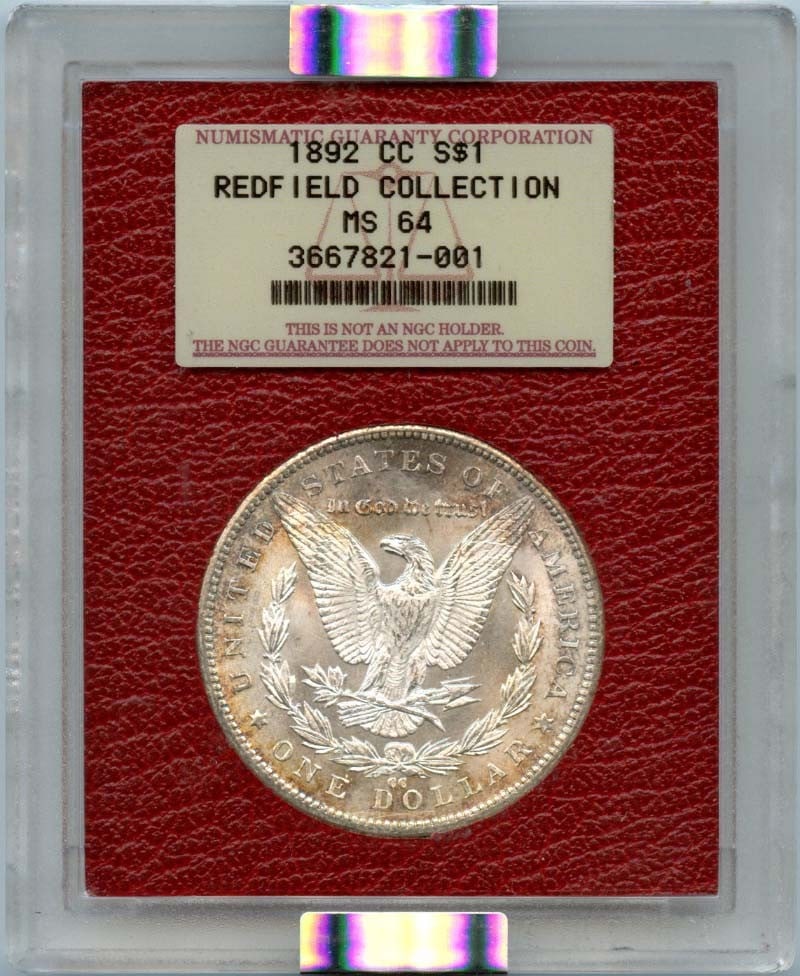 NGC MS64 1892 Carson City Morgan Silver Dollar Redfield Hoard: NGC MS64 1892 Carson City Morgan Silver Dollar Redfield Hoard This 1892-CC Morgan Dollar is part of the Redfield Hoard and has been certified by NGC with a grade of MS64. Struck at the Carson City Min