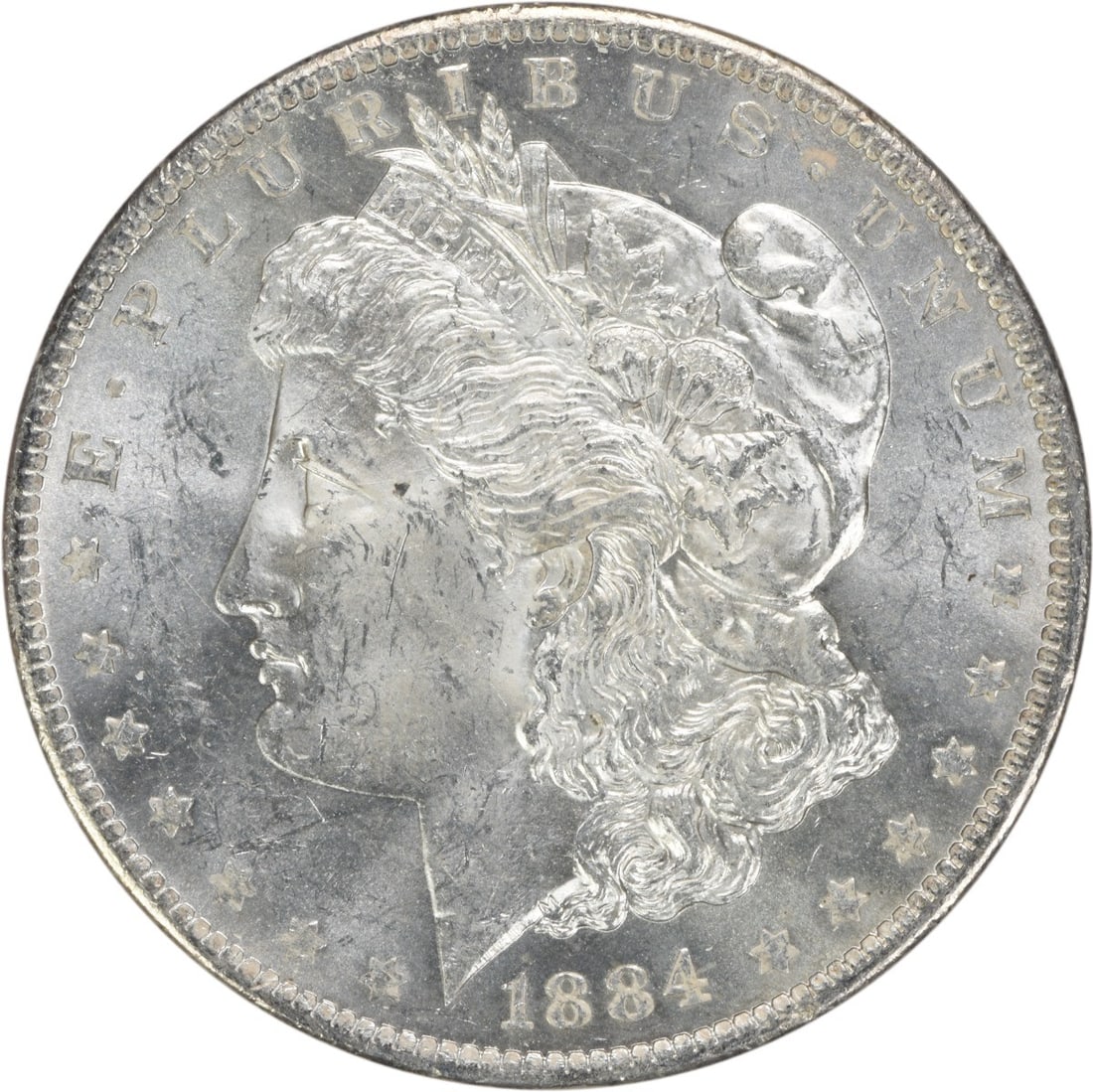 1884 O Morgan Dollar Silver Coin Brilliant Uncirculated Uncertified: 1884 O Morgan Dollar Silver Coin Brilliant Uncirculated Uncertified This 1884-O Morgan Silver Dollar is an uncirculated coin from the New Orleans Mint. Composed of silver, it is graded as Brilliant Un