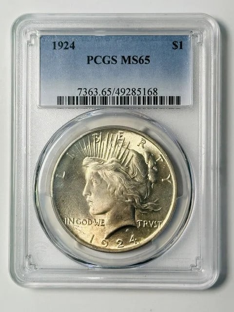 PCGS MS-65 1924 Peace Silver Dollar Philadelphia: PCGS MS-65 1924 Peace Silver Dollar Philadelphia 1924 Peace Dollar certified by PCGS and graded MS 65. This pre-owned silver dollar was minted in Philadelphia and issued in the USA. Specifications Ite