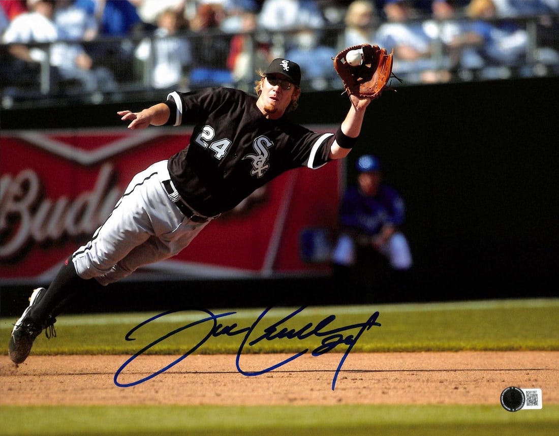 Beckett Authenticated Joe Crede Chicago White Sox 11x14 Signed Photo: Beckett Authenticated Joe Crede Chicago White Sox 11x14 Signed Photo This 11x14 action photograph features former Chicago White Sox third baseman Joe Crede making a diving play on the field. The photo