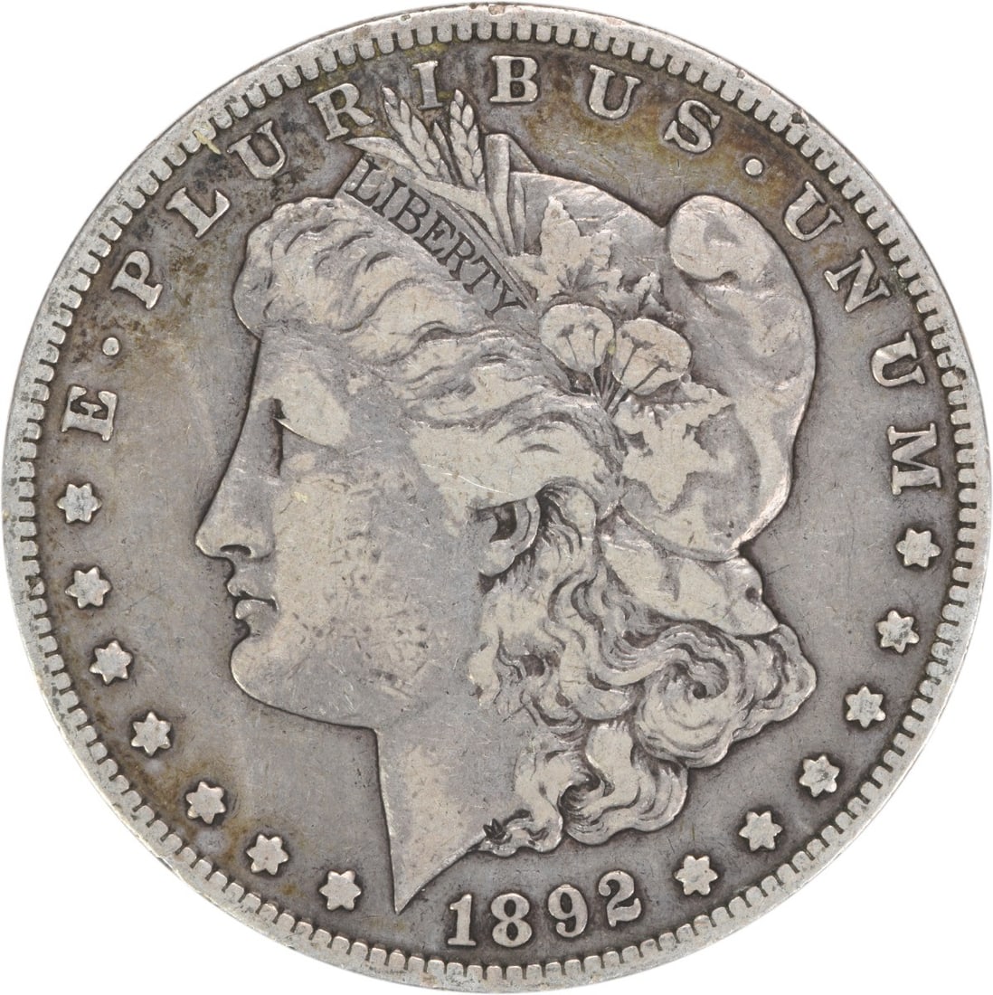 1892-S Morgan Silver Dollar VF Uncertified San Francisco Coin: 1892-S Morgan Silver Dollar VF Uncertified San Francisco Coin This 1892-S Morgan Silver Dollar is a captivating piece of numismatic history, featuring the renowned design by George T. Morgan. Struck a