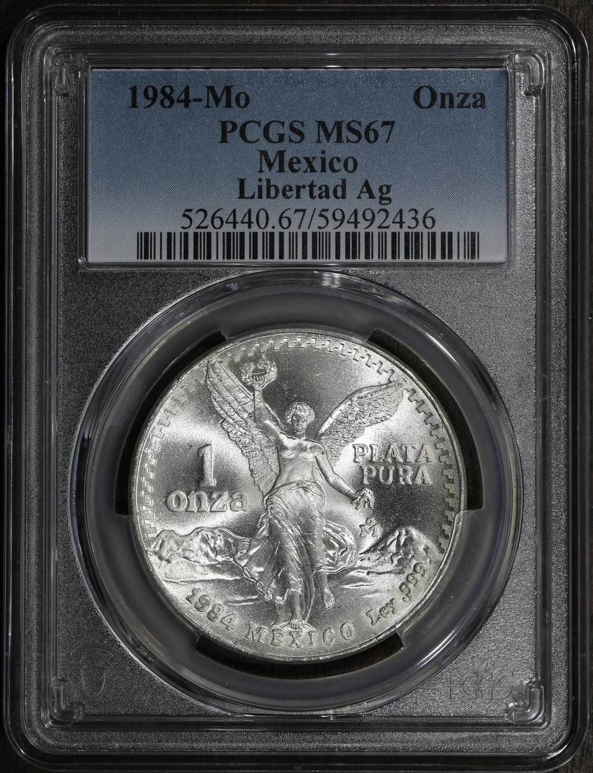 PCGS MS67 1984-Mo Mexico 1 oz Silver Libertad Onza Coin: PCGS MS67 1984-Mo Mexico 1 oz Silver Libertad Onza Coin 1984 Mexico 1 oz Silver Libertad Onza coin graded MS 67 by PCGS. It is a pre-owned Mexican Libertad struck in silver with 0.999 fineness and cer