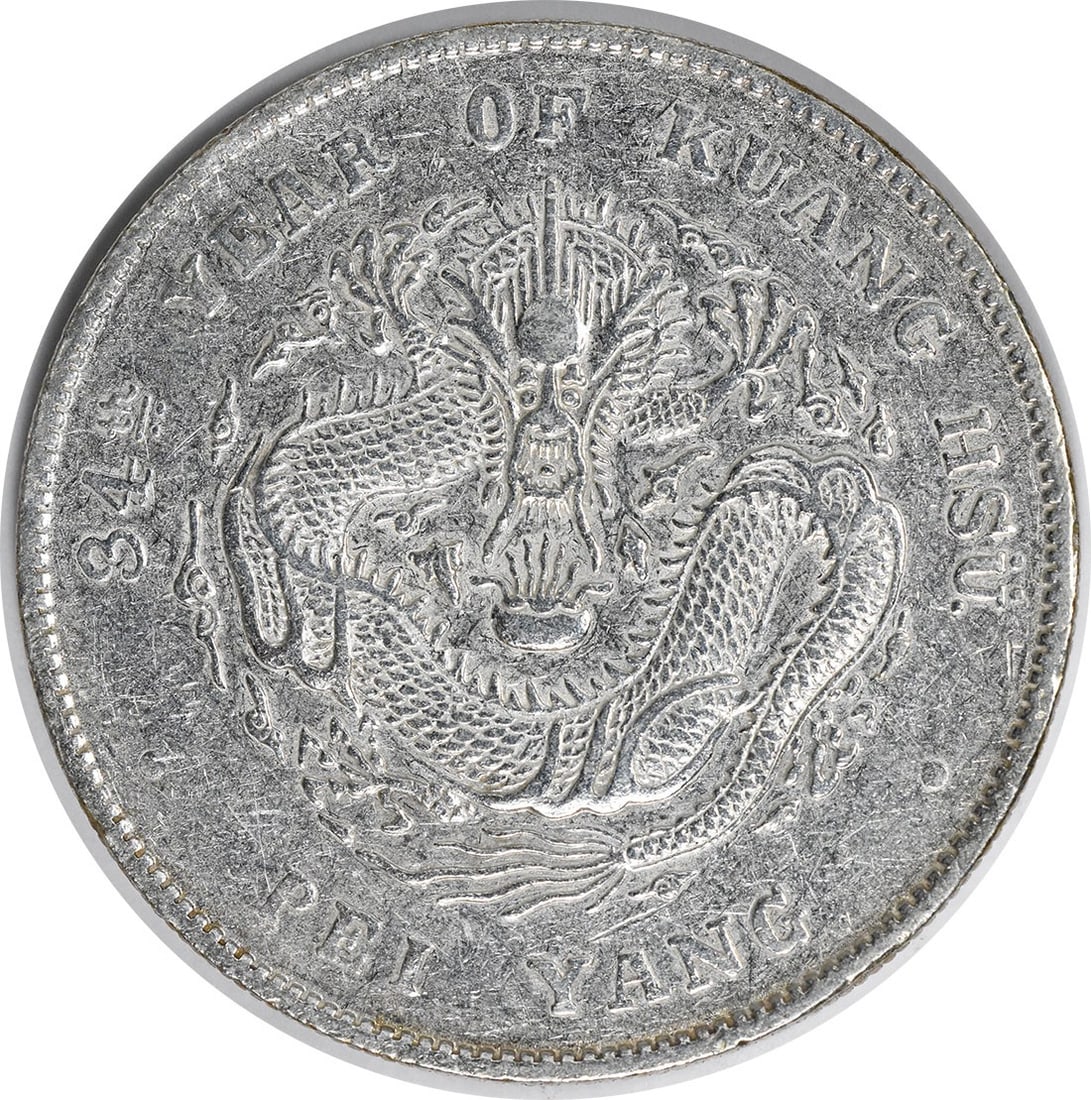 YR34 China Chihli Dollar Y73.3 Silver Coin Uncertified: YR34 China Chihli Dollar Y73.3 Silver Coin Uncertified This China-Chihli Dollar, designated Y73.3, features a striking silver composition and is classified as Extra Fine (XF) grade. It is a circulated