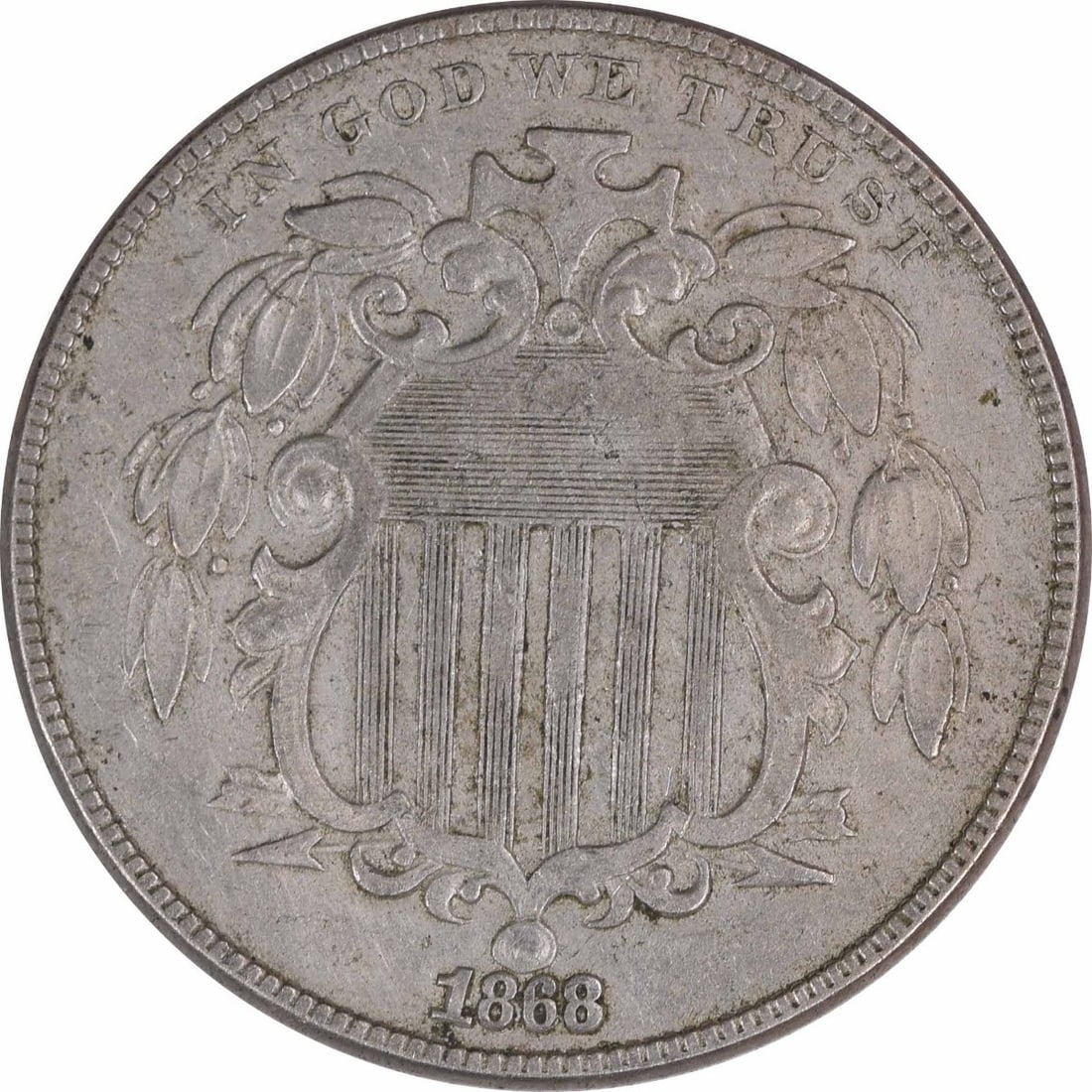 United States 1868 Shield 5C Nickel EF Uncertified: United States 1868 Shield 5C Nickel EF Uncertified 1868 Shield Nickel, circulated and uncertified, featuring the Shield design by James Barton Longacre. This 5-cent United States coin is graded EF and