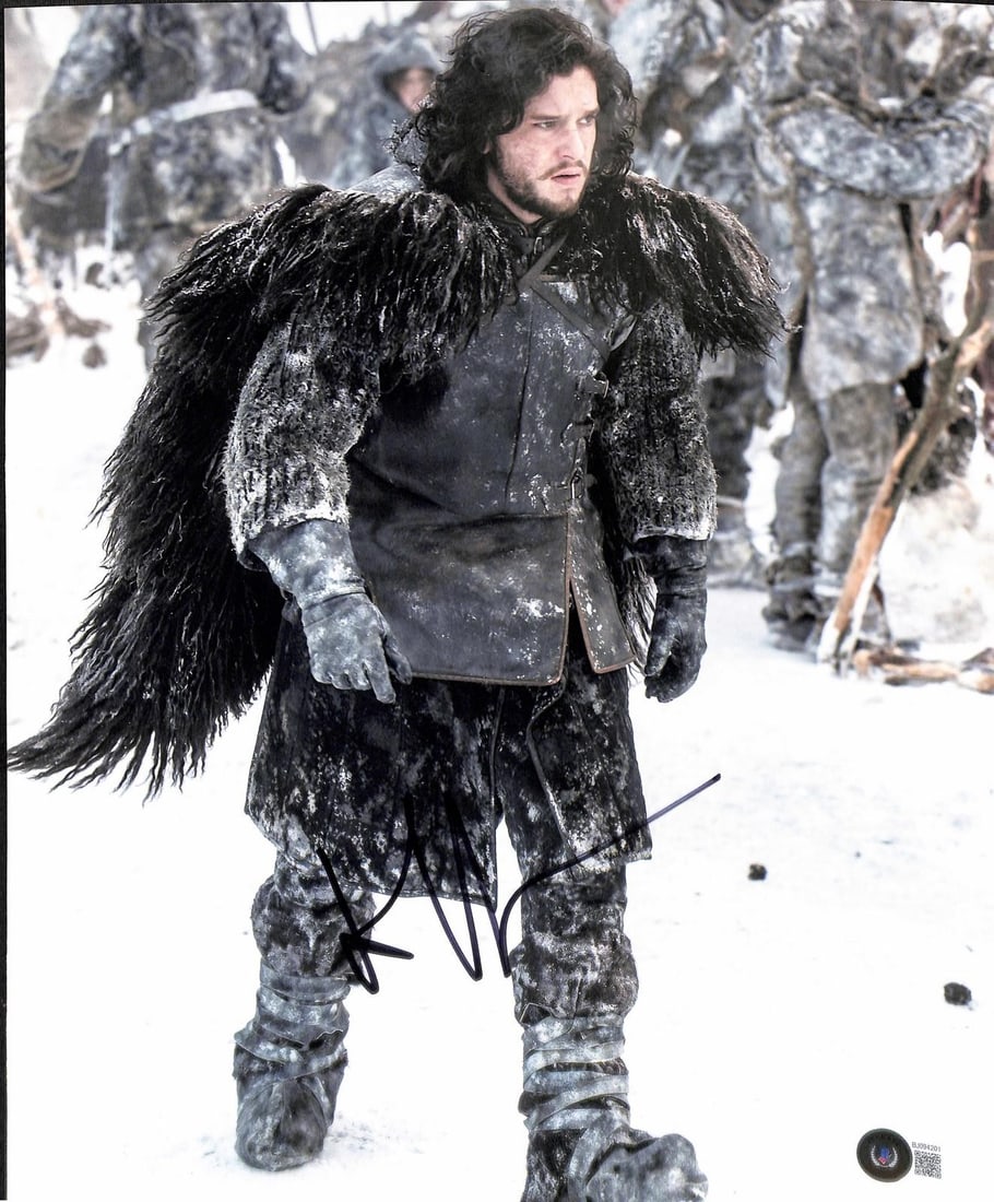 Signed 11x14 Kit Harington Game of Thrones photo Beckett: Signed 11x14 Kit Harington Game of Thrones photo Beckett This 11x14 photograph features a hand-signed autograph by Kit Harington, known for his role as Jon Snow in the HBO series Game of Thrones. The 