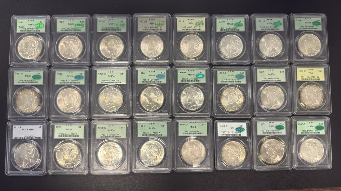 24 PCGS MS64 Peace Silver Dollars 1921 to 1935 Complete Set: 24 PCGS MS64 Peace Silver Dollars 1921 to 1935 Complete Set Complete 24-coin Peace Dollar set spanning 1921 to 1935. This pre-owned set includes $1 silver coins graded MS64 by PCGS. Specifications Ite