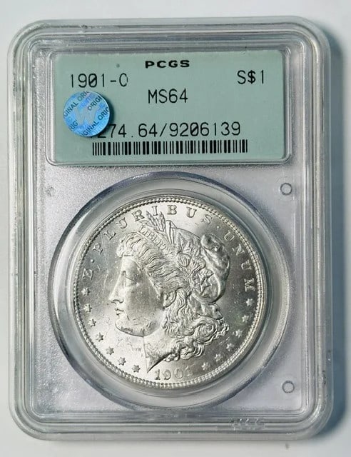 PCGS MS-64 1901-O Morgan Silver Dollar Sight White: PCGS MS-64 1901-O Morgan Silver Dollar Sight White Pre-owned 1901-O Morgan Silver Dollar graded MS-64 by PCGS and noted as Sight White. Housed in an old green holder. Specifications Item Type: Morgan 