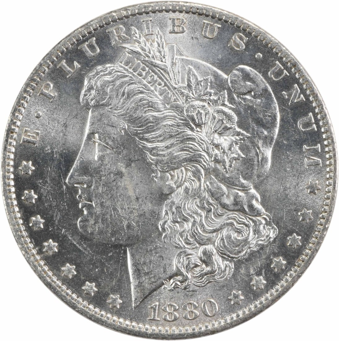 Uncirculated 1880-O Silver Morgan Dollar Brilliant Uncertified US Coin: Uncirculated 1880-O Silver Morgan Dollar Brilliant Uncertified US Coin This 1880-O Morgan Silver Dollar is an uncirculated, pre-owned coin struck at the New Orleans Mint. Composed of silver, it featur