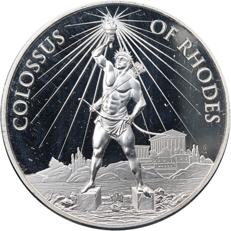 1 Ounce .999 Silver Round Colossus of Rhodes 7 Wonders BU: 1 Ounce .999 Silver Round Colossus of Rhodes 7 Wonders BU Original Colossus of Rhodes 7 Wonders of the Ancient World silver round with uncirculated BU condition. This pre-owned piece has .999 fine sil