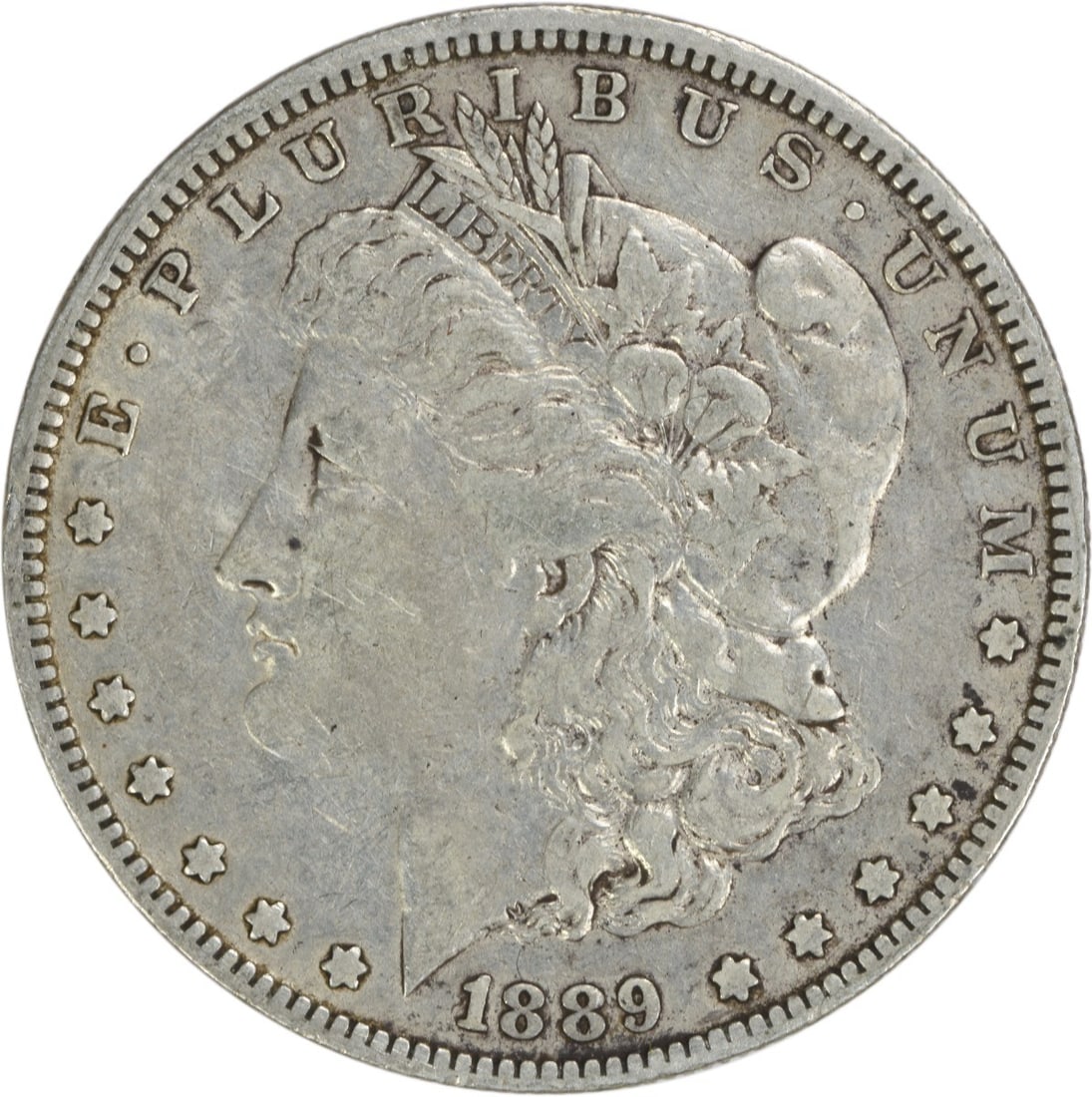 1889-O Morgan Silver Dollar Uncertified 90% Silver Coin: 1889-O Morgan Silver Dollar Uncertified 90% Silver Coin This 1889-O Morgan Silver Dollar is a remarkable piece of American numismatic history. Struck in New Orleans, this coin features a composition o