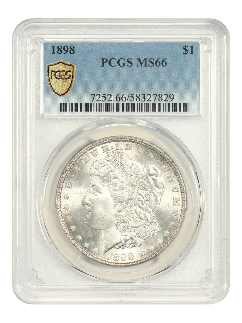 1898 Morgan Dollar $1 PCGS MS66 Philadelphia Mint: 1898 Morgan Dollar $1 PCGS MS66 Philadelphia Mint 1898 Morgan Dollar $1 from Philadelphia, certified by PCGS and graded MS66. This uncirculated example is presented as a pre-owned coin and is describe