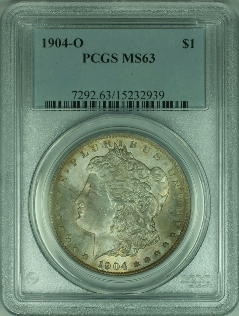PCGS MS63 1904 New Orleans Morgan Silver Dollar with Attractive Toning: PCGS MS63 1904 New Orleans Morgan Silver Dollar with Attractive Toning This 1904-O Morgan Silver Dollar is certified by PCGS with a grade of MS-63. Struck at the New Orleans Mint, the coin features a 