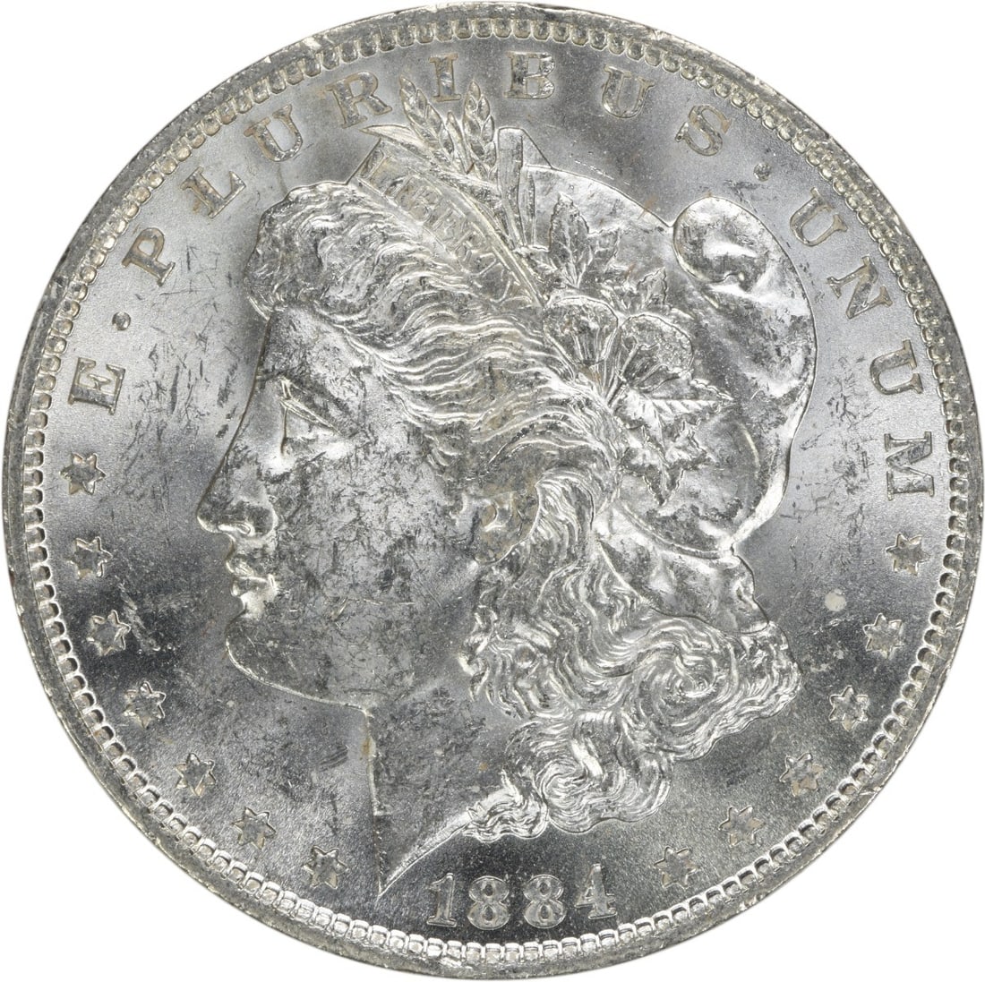Uncirculated 1884 O Morgan Silver Dollar Brilliant Uncertified US Coin: Uncirculated 1884 O Morgan Silver Dollar Brilliant Uncertified US Coin This is an 1884-O Morgan Silver Dollar from the New Orleans mint. The coin is uncirculated and in Brilliant Uncirculated (BU) con