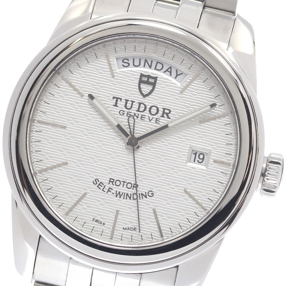 TUDOR Glamour Date-Day 56000 Automatic Stainless Steel Mens Wristwatch: TUDOR Glamour Date-Day 56000 Automatic Stainless Steel Mens Wristwatch Pre-owned TUDOR Glamour Date-Day automatic men's wristwatch with a silver dial and stainless steel case and bracelet. This watch 