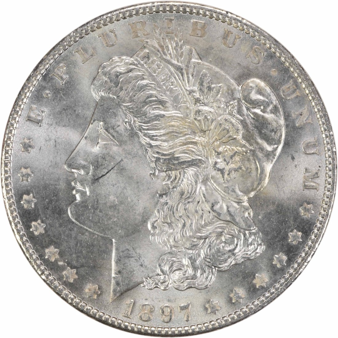 Uncirculated 1897 Silver Morgan Dollar Brilliant Uncertified US Coin: Uncirculated 1897 Silver Morgan Dollar Brilliant Uncertified US Coin This 1897 Morgan Silver Dollar is an uncirculated coin from the United States, featuring a brilliant uncirculated (BU) grade. It is