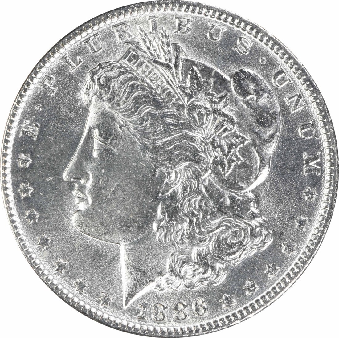 1886 Uncertified Morgan Silver Dollar $1 Uncirculated: 1886 Uncertified Morgan Silver Dollar $1 Uncirculated 1886 Morgan Silver Dollar in uncirculated, pre-owned condition. This silver $1 coin is listed as uncertified and graded MS63. Specifications Coin: