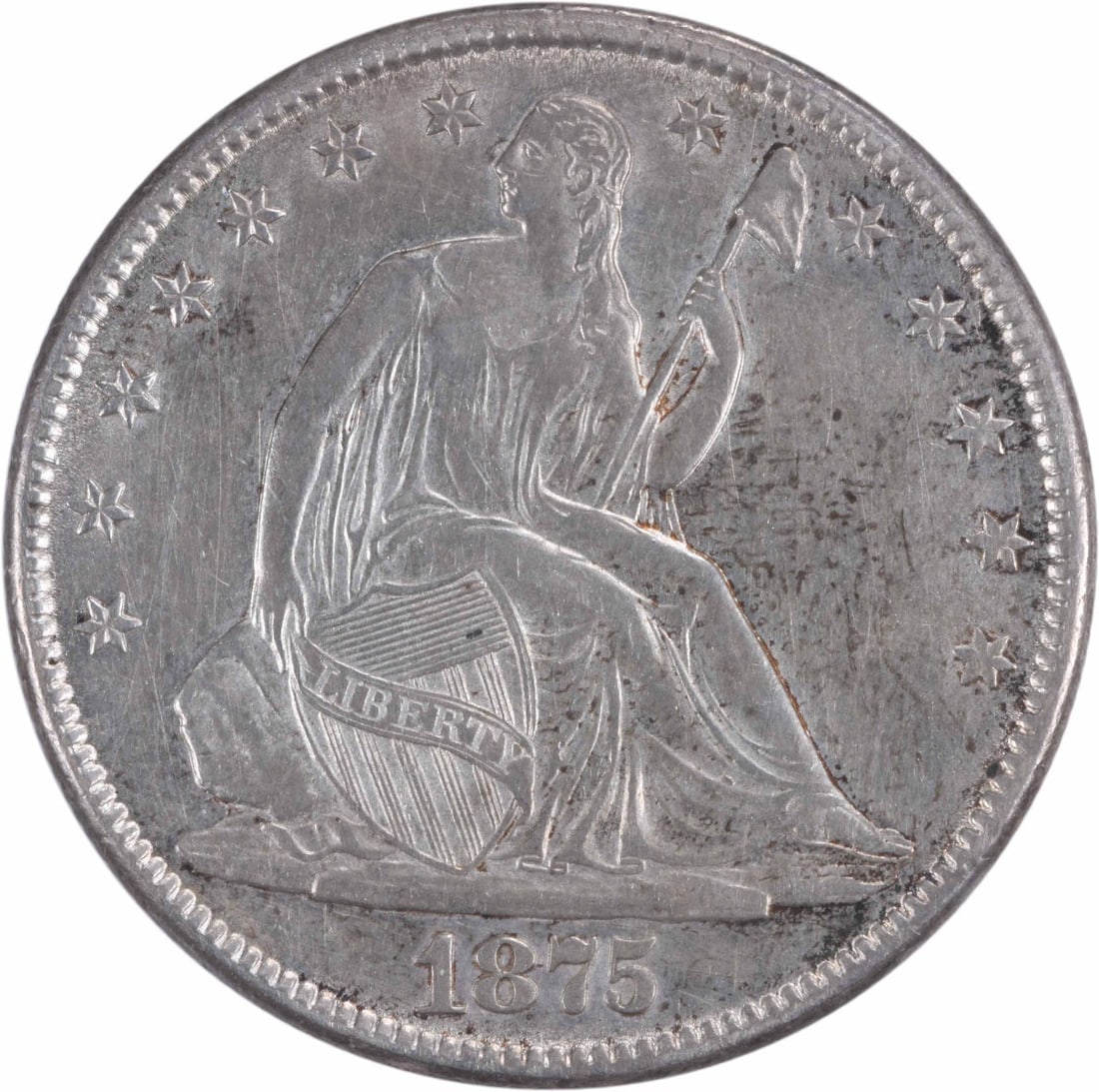 1875-CC Liberty Seated Half Dollar 50C AU Uncertified Silver Coin: 1875-CC Liberty Seated Half Dollar 50C AU Uncertified Silver Coin This 1875-CC Liberty Seated Half Dollar is an exquisite piece of numismatic history, featuring the iconic design by Thomas Sully and C