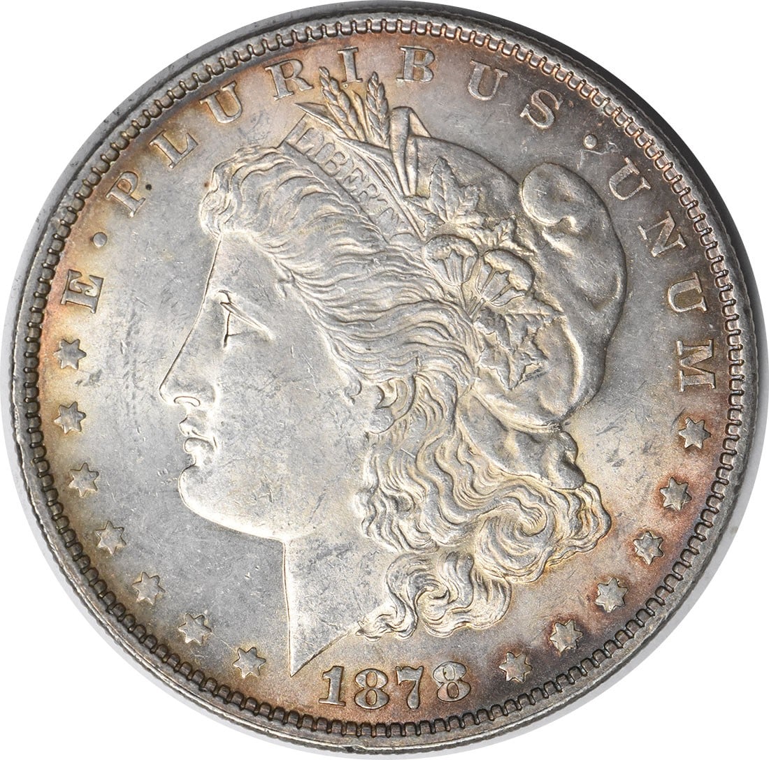 Uncirculated 1878 Morgan Dollar 7 Tail Feathers Reverse Silver Coin BU: Uncirculated 1878 Morgan Dollar 7 Tail Feathers Reverse Silver Coin BU This is an 1878 Morgan Silver Dollar featuring the 7 Tail Feathers Reverse of 1878. The coin is in brilliant uncirculated conditi