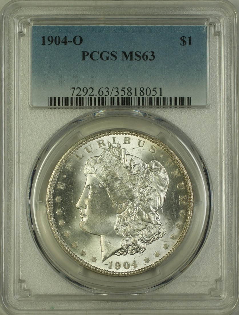 PCGS MS63 1904-O Morgan Dollar $1 Silver Coin: PCGS MS63 1904-O Morgan Dollar $1 Silver Coin This is a 1904-O Morgan Silver Dollar graded MS-63 by PCGS. Minted in New Orleans, this uncirculated coin is composed of silver and has a $1 denomination.