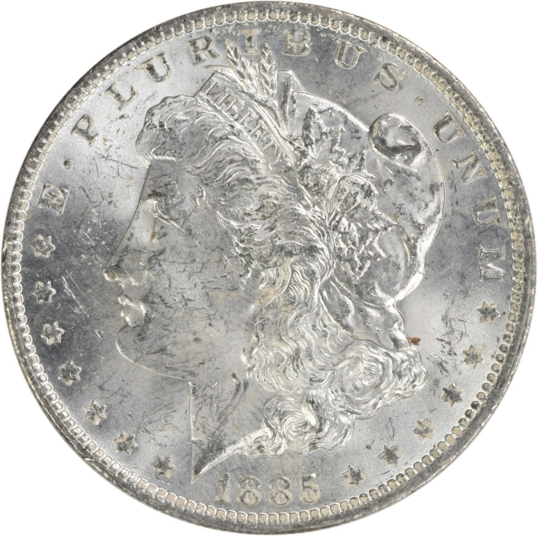 Uncirculated 1885 O Silver Dollar Morgan Type Brilliant Uncertified Example: Uncirculated 1885 O Silver Dollar Morgan Type Brilliant Uncertified Example This is an 1885-O Morgan Silver Dollar in brilliant uncirculated (BU) condition. The coin was minted in New Orleans and is c