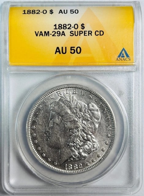 ANACS AU-50 1882 O Morgan Silver Dollar VAM-29A Super CD: ANACS AU-50 1882 O Morgan Silver Dollar VAM-29A Super CD 1882-O Morgan Silver Dollar certified by ANACS and graded AU-50. This pre-owned coin is attributed as VAM-29A Super CD and features a silver co