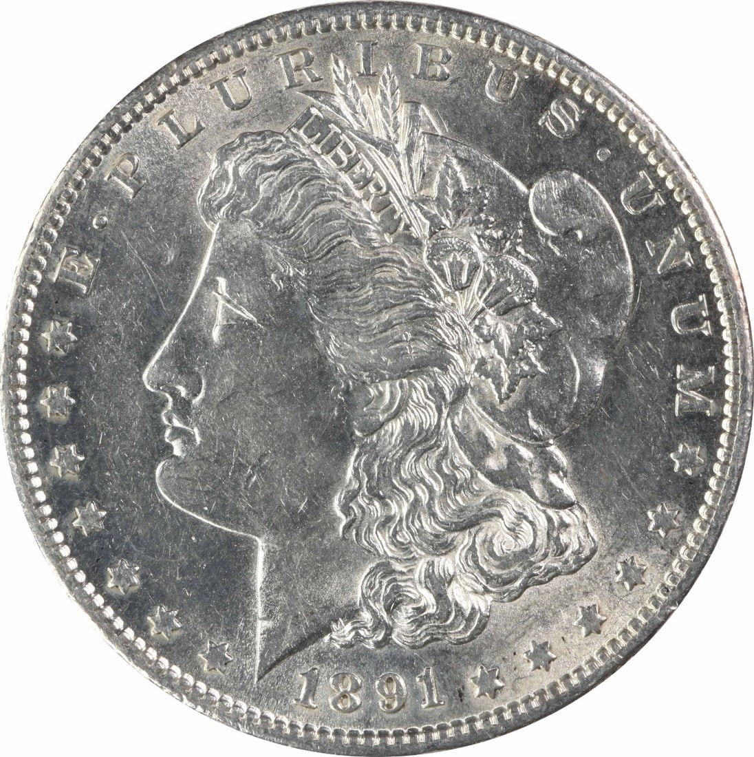 1891 San Francisco Morgan Dollar AU Grade 90 Percent Silver Uncertified: 1891 San Francisco Morgan Dollar AU Grade 90 Percent Silver Uncertified This 1891-S Morgan Silver Dollar is an AU (About Uncirculated) grade coin, struck at the San Francisco Mint. It is composed of 9