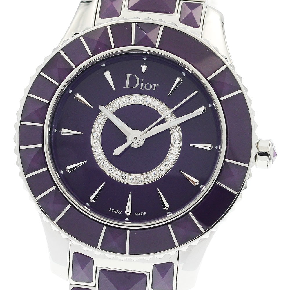 Dior Crystal CD143112 Womens Quartz Wristwatch Purple Dial: Dior Crystal CD143112 Womens Quartz Wristwatch Purple Dial Pre-owned Dior Crystal women's wristwatch with a quartz movement and a purple dial. This Swiss-made watch features a stainless steel and crys