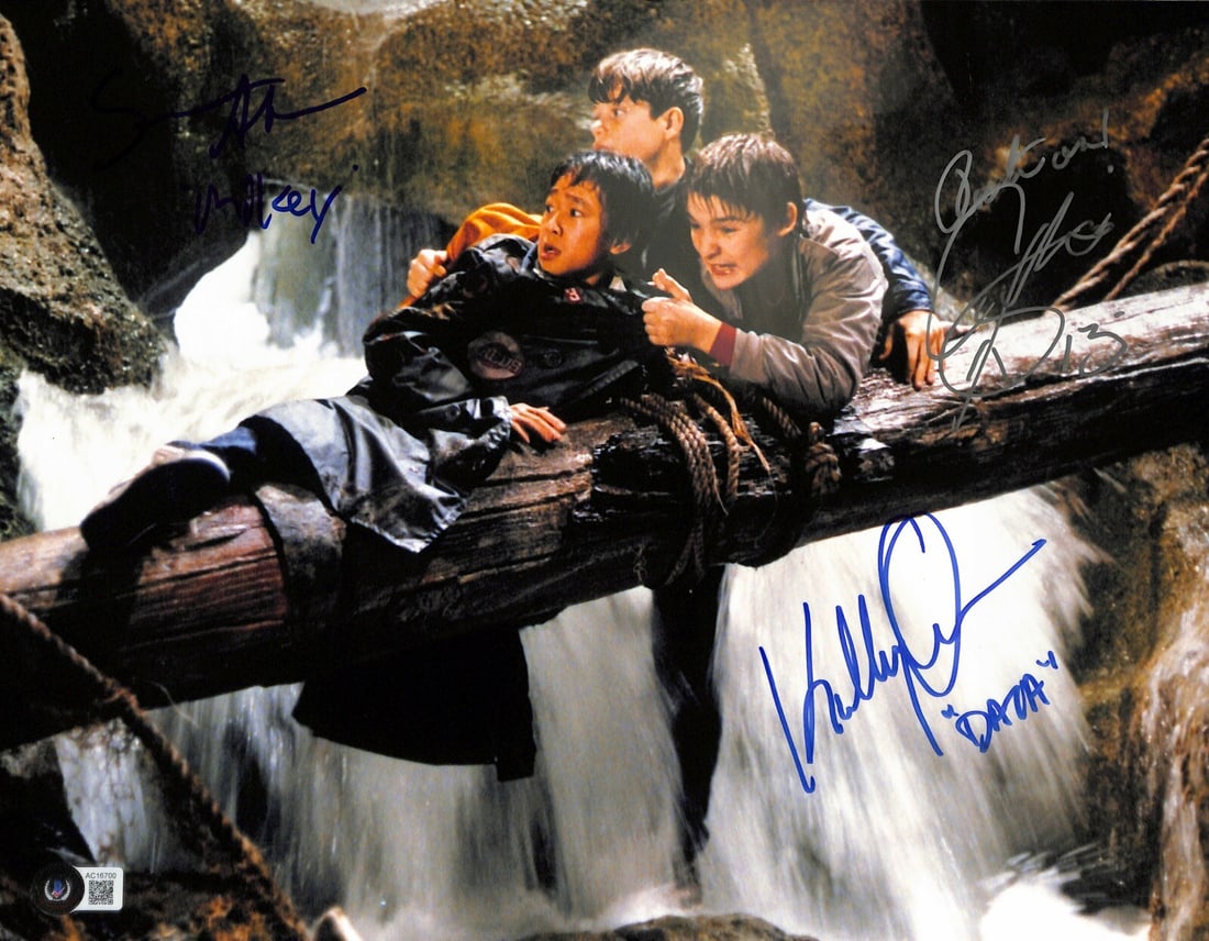 The Goonies Signed 11x14 Photo by Astin Quan Feldman BAS: The Goonies Signed 11x14 Photo by Astin Quan Feldman BAS This captivating 11x14 color photograph features the iconic cast from "The Goonies," signed by actors Sean Astin, Ke Huy Quan, and Corey Feldma