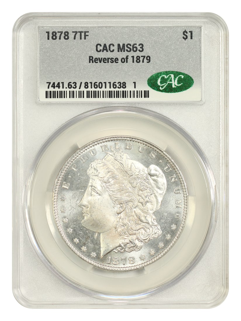 CACG MS63 1878 7TF Morgan Dollar Reverse of 1879 Variety: CACG MS63 1878 7TF Morgan Dollar Reverse of 1879 Variety An 1878 Morgan Dollar, 7TF variety with Reverse of 1879, certified by CACG and graded MS63. This first-year Morgan dollar variety is noted as n