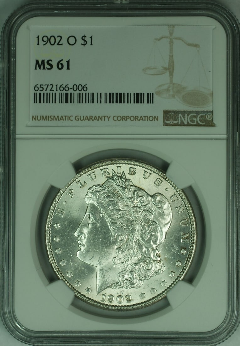 1902-O Morgan Dollar Silver $1 Coin NGC MS-61 New Orleans Mint: 1902-O Morgan Dollar Silver $1 Coin NGC MS-61 New Orleans Mint This is a 1902-O Morgan Silver Dollar graded MS-61 by NGC. The coin was minted in New Orleans and is composed of silver. It is uncirculat