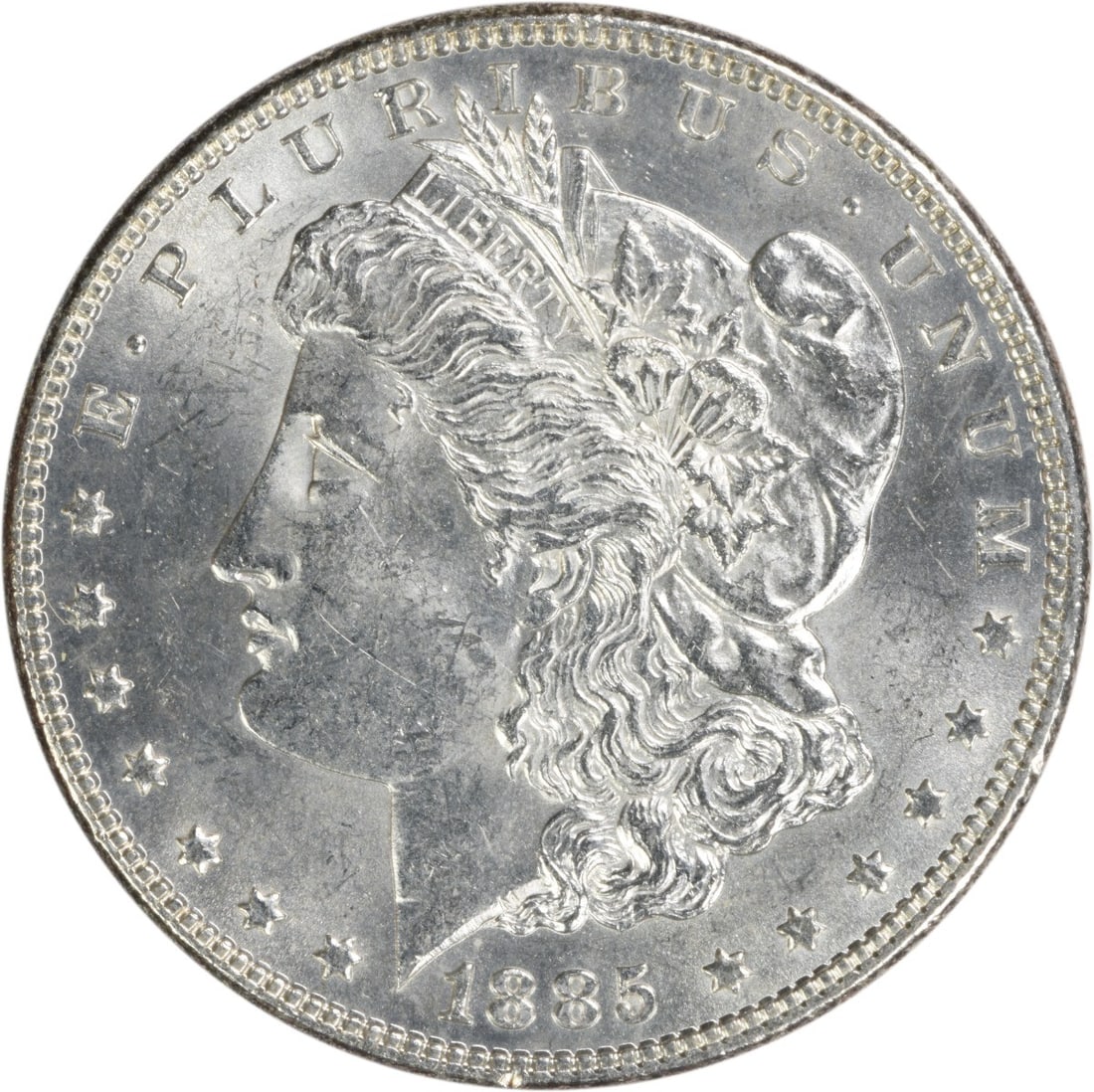 Uncirculated 1885 Silver Dollar Morgan Type Brilliant Uncertified US Coin: Uncirculated 1885 Silver Dollar Morgan Type Brilliant Uncertified US Coin This is an uncirculated 1885 Morgan Silver Dollar from the United States. The coin is composed of silver and features no mint 