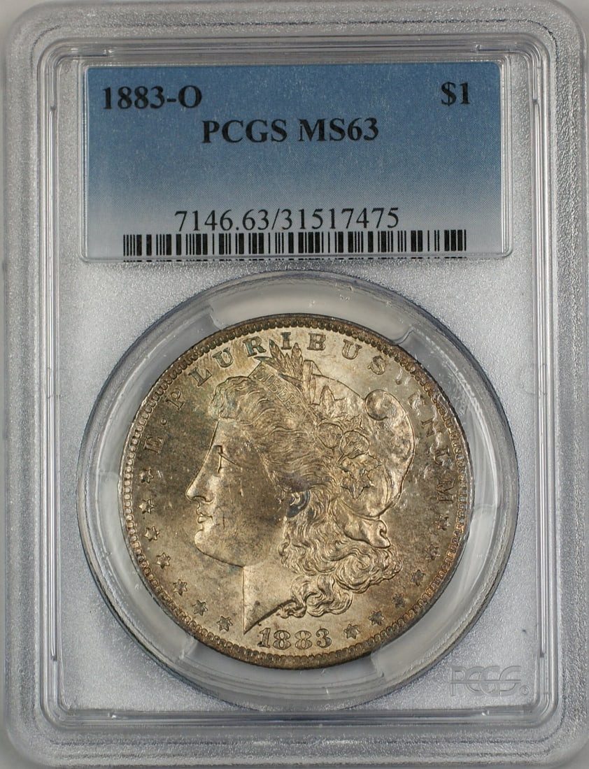 PCGS MS63 1883-O Morgan Dollar Silver Coin with Attractive Toning: PCGS MS63 1883-O Morgan Dollar Silver Coin with Attractive Toning This 1883-O Morgan Silver Dollar is a $1 coin certified by PCGS with a grade of MS 63. It features attractive toning on both the obver