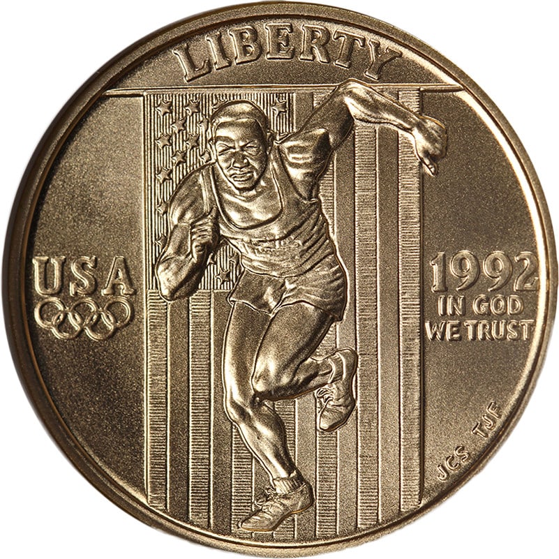1992 W Olympics $5 Gold Commemorative NGC MS70 Coin: 1992 W Olympics $5 Gold Commemorative NGC MS70 Coin This is an original 1992-W Olympics Commemorative Gold $5 coin graded MS70 by NGC. The coin is uncirculated and features excellent luster and a stro