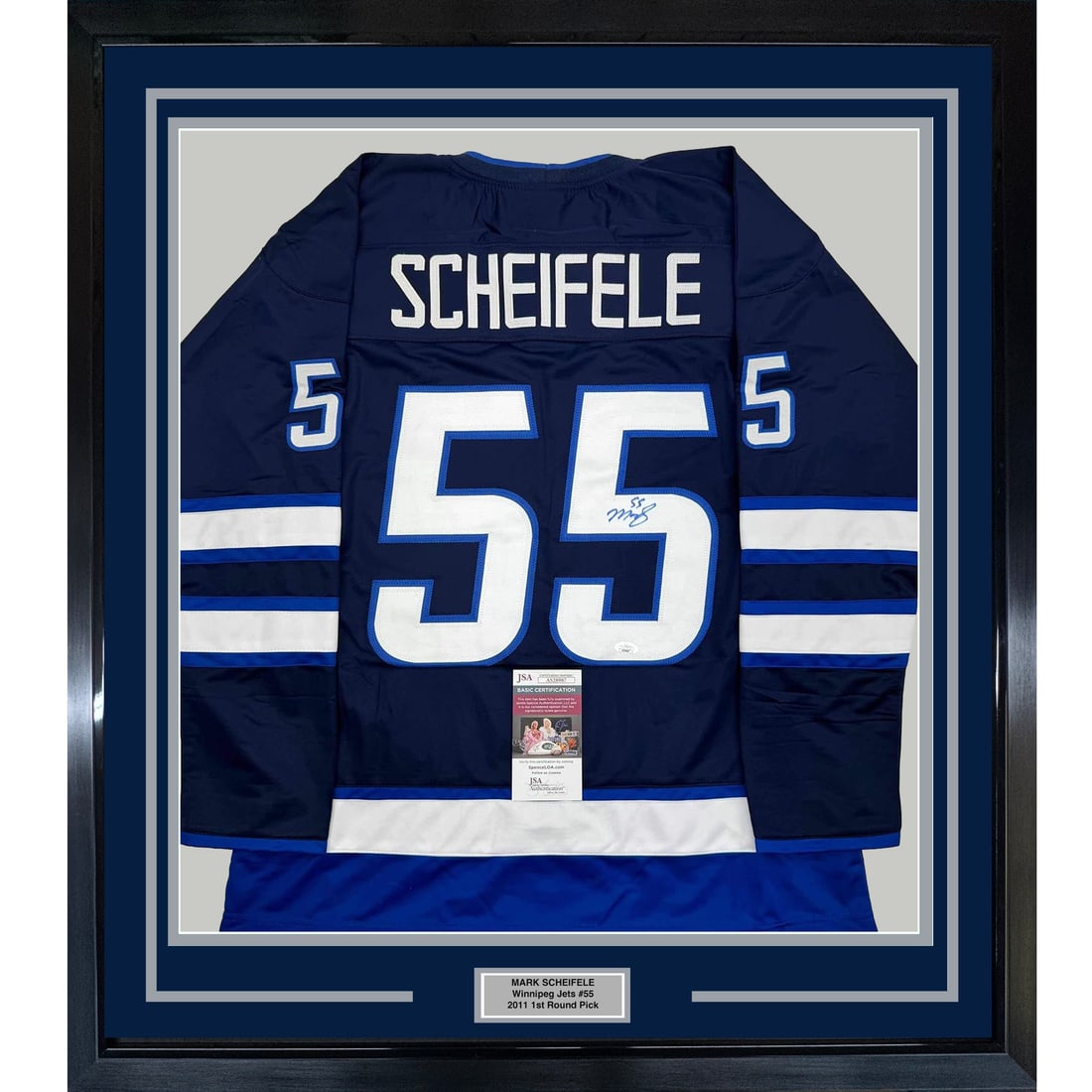 Framed Autographed Mark Scheifele Winnipeg Jets Jersey with JSA COA 35x39: Framed Autographed Mark Scheifele Winnipeg Jets Jersey with JSA COA 35x39 This professionally framed autographed jersey features Mark Scheifele of the Winnipeg Jets. The jersey is an original piece an