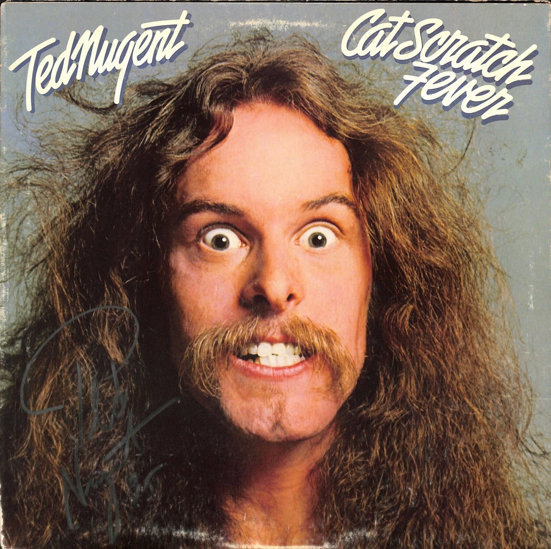 Cat Scratch Fever Album Autographed by Ted Nugent with Beckett COA: Cat Scratch Fever Album Autographed by Ted Nugent with Beckett COA This is an original "Cat Scratch Fever" album autographed by musician Ted Nugent. The signature, made in silver permanent marker, was