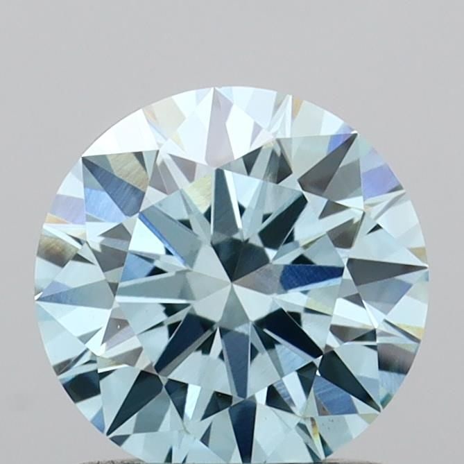 Ideal Loose Diamond - ROUND 1.03ct Fancy Vivid Blue VVS2: Ideal Loose Diamond - ROUND 1.03ct Fancy Vivid Blue VVS2 Source: This is a real non-mined Diamond that has been grown in a lab Shape: ROUND Carats: 1.03 Color: Fancy Vivid Blue Certification: IGI Vide