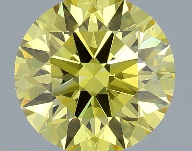 Ideal Loose Diamond - ROUND 0.46ct Fancy Vivid Yellow VS2: Ideal Loose Diamond - ROUND 0.46ct Fancy Vivid Yellow VS2 Source: This is a real non-mined Diamond that has been grown in a lab Shape: ROUND Carats: 0.46 Color: Fancy Vivid Yellow Certification: IGI V