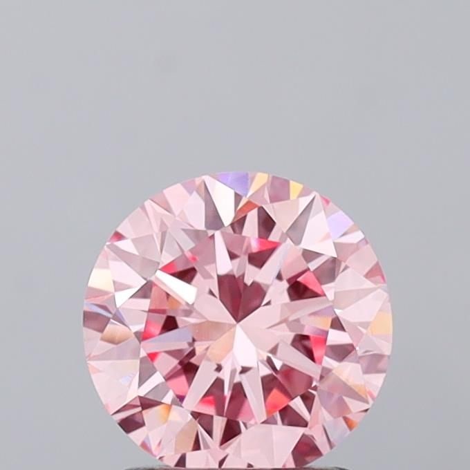 Loose Diamond - ROUND 1.45ct Fancy Vivid Pink VVS2: Loose Diamond - ROUND 1.45ct Fancy Vivid Pink VVS2 Source: This is a real non-mined Diamond that has been grown in a lab Shape: ROUND Carats: 1.45 Color: Fancy Vivid Pink Certification: IGI Video: