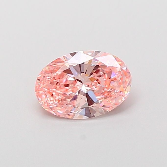 Loose Diamond - OVAL 1.0ct Fancy Vivid Pink VS2: Loose Diamond - OVAL 1.0ct Fancy Vivid Pink VS2 Source: This is a real non-mined Diamond that has been grown in a lab Shape: OVAL Carats: 1.0 Color: Fancy Vivid Pink Certification: IGI Additional imag