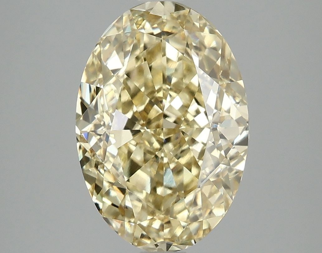 Loose Diamond - OVAL 4.09ct Fancy Intense Yellow VVS2: Loose Diamond - OVAL 4.09ct Fancy Intense Yellow VVS2 Source: This is a real non-mined Diamond that has been grown in a lab Shape: OVAL Carats: 4.09 Color: Fancy Intense Yellow Certification: IGI Vide