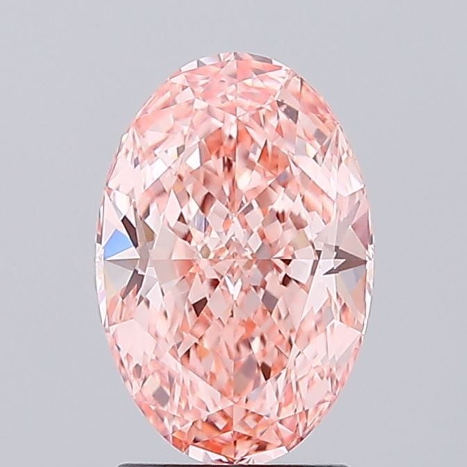 Loose Diamond - OVAL 1.94ct Fancy Vivid Orangey Pink VVS2: Loose Diamond - OVAL 1.94ct Fancy Vivid Orangey Pink VVS2 Source: This is a real non-mined Diamond that has been grown in a lab Shape: OVAL Carats: 1.94 Color: Fancy Vivid Orangey Pink Certification: 