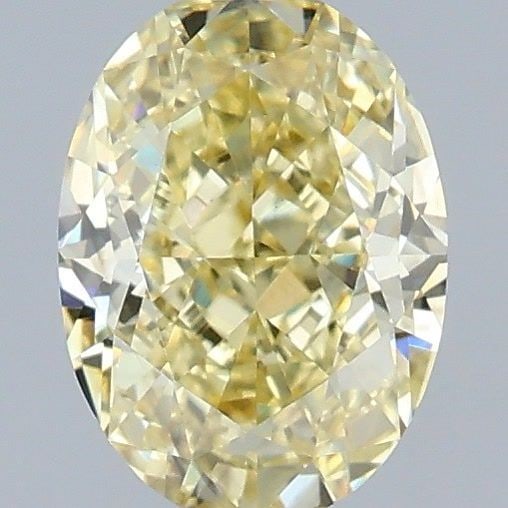 Loose Diamond - OVAL 1.06ct Fancy Yellow VS2: Loose Diamond - OVAL 1.06ct Fancy Yellow VS2 Source: This is a real non-mined Diamond that has been grown in a lab Shape: OVAL Carats: 1.06 Color: Fancy Yellow Certification: IGI Video: