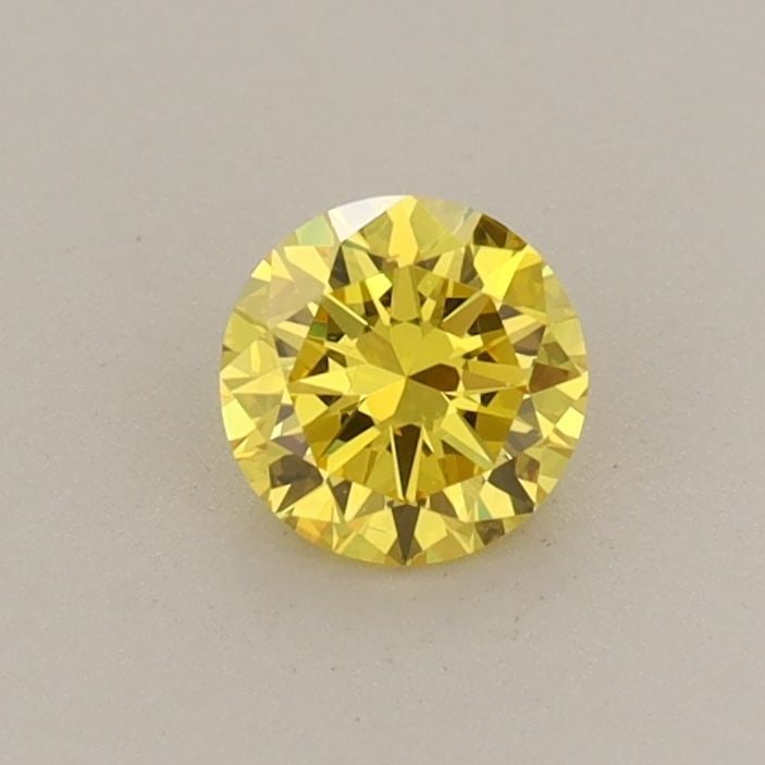 Loose Diamond - ROUND 0.37ct Fancy Vivid Yellow VS2: Loose Diamond - ROUND 0.37ct Fancy Vivid Yellow VS2 Source: This is a real non-mined Diamond that has been grown in a lab Shape: ROUND Carats: 0.37 Color: Fancy Vivid Yellow Certification: IGI Video: