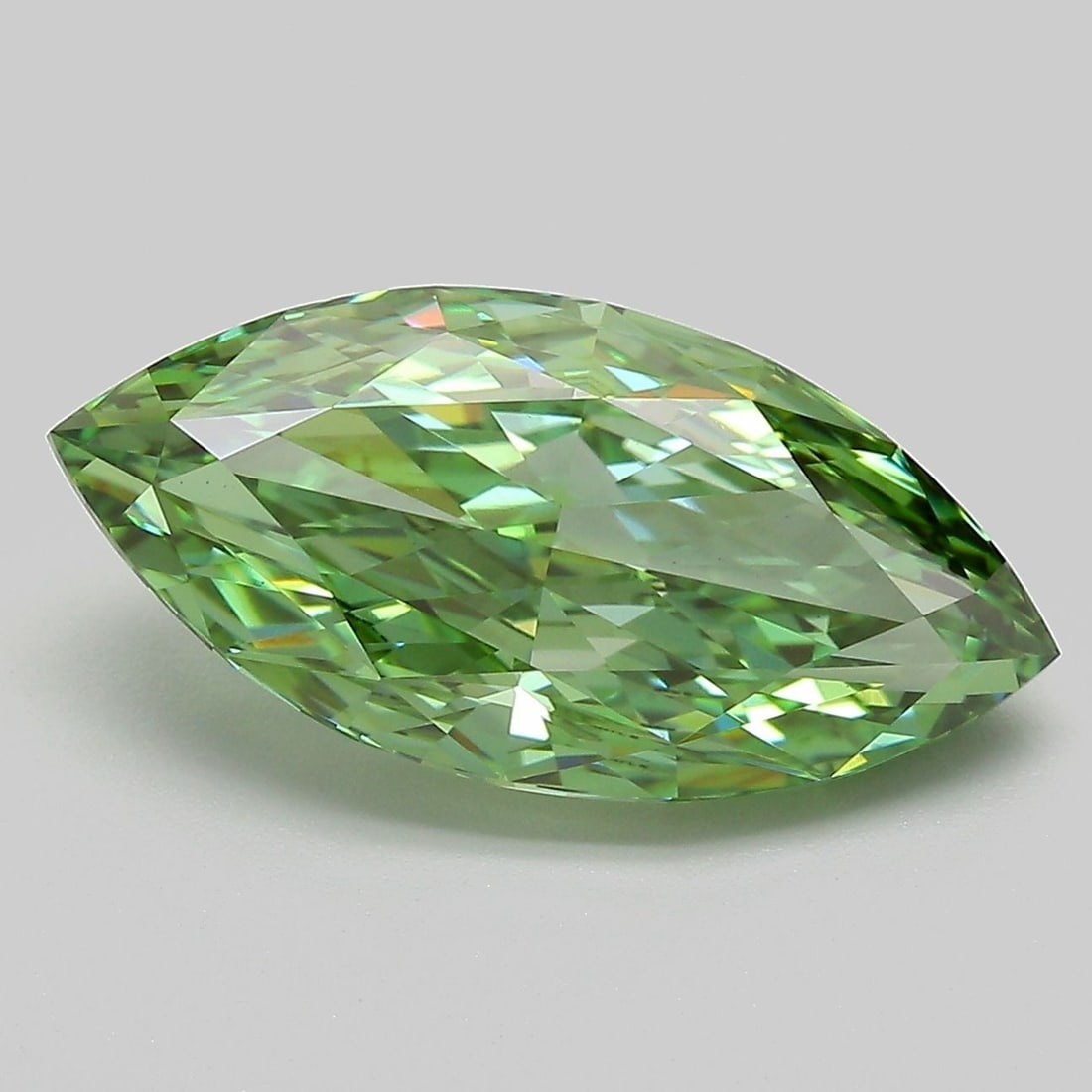 Loose Diamond - MARQUISE 5.04ct Fancy Vivid Green VVS2: Loose Diamond - MARQUISE 5.04ct Fancy Vivid Green VVS2 Source: This is a real non-mined Diamond that has been grown in a lab Shape: MARQUISE Carats: 5.04 Color: Fancy Vivid Green Certification: IGI Ad